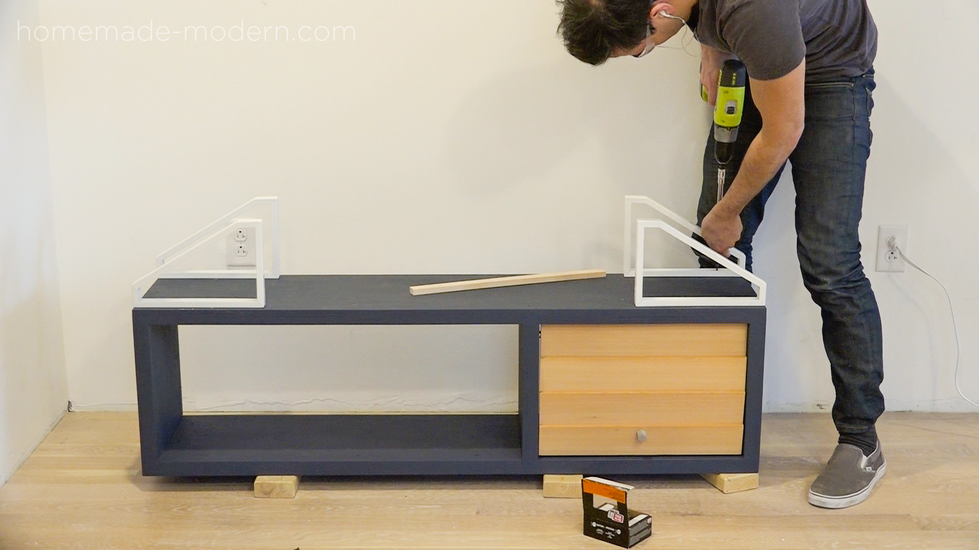 This DIY mid-century model media console is made from materials available at Home Depot for less than $100.  Full instructions can be found at HomeMade-modern.com.