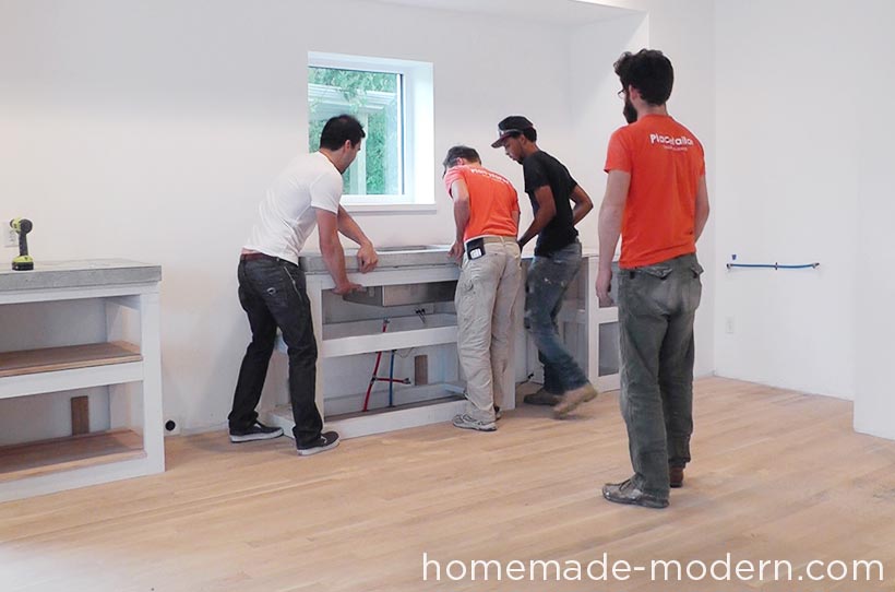 This entire DIY kitchen project cost less than $3500 for everything including appliances. There are three videos on the HomeMade Modern YouTube channel that show how to make the kitchen cabinets, concrete countertops and open shelving. For more information go to HomeMade-Modern.com.