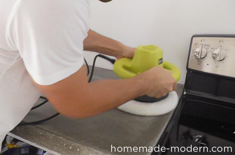 This concrete kitchen countertop was built for less than $120. The entire kitchen is a DIY project that costs less than $3500 for everything including appliances. There are three videos on the HomeMade Modern YouTube channel that show how to make the kitchen cabinets, concrete countertop and open shelving. For more information go to HomeMade-Modern.com.