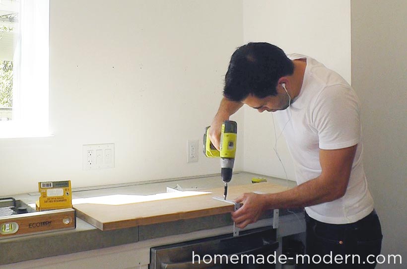 This entire kitchen is a DIY project that costs less than $3500 for everything including appliances. There are three videos on the HomeMade Modern YouTube channel that show how to make the kitchen cabinets, concrete countertop and open shelving. For more information go to HomeMade-Modern.com.