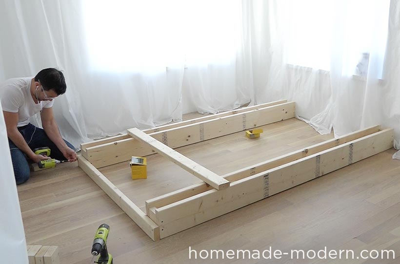 This DIY platform bed is made out of 2x8s, 2x4s and pine boards. I made this one for a full-sized mattress, but the design can be scaled up or down for different sized mattresses. This modern bed also has storage underneath it. For more information go to HomeMade-Modern.com.
